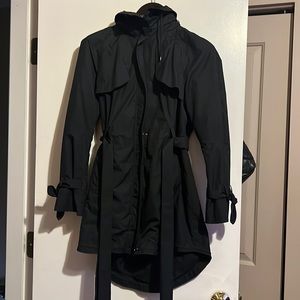 Almost new Cole Haan raincoat. Size large. Great condition. With hood!